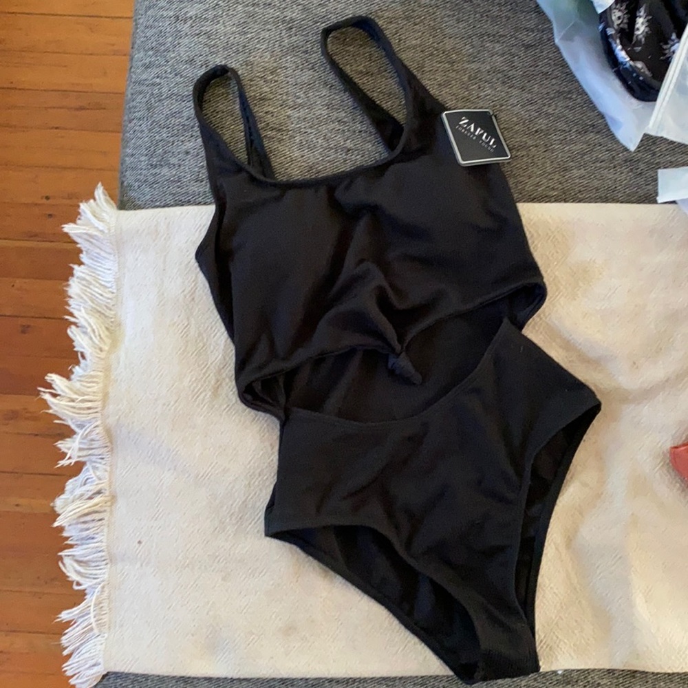 Black one piece swimwear staple